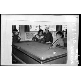 Boys playing pool, Porirua