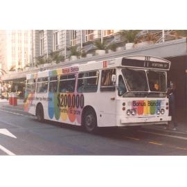 Leyland Leopard with 'Bonus Bonds' advertisment painted on