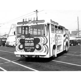 Bus with Philips TV advertisment painted on