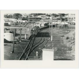 Train at Johnsonville Railway Station, view from Broderick Road overbridge.