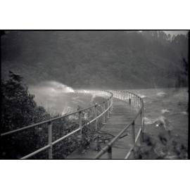 Photograph of water blowing over upper Karori dam during the Wahine storm