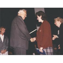 Photo of Sacred Heart student receiving an award 